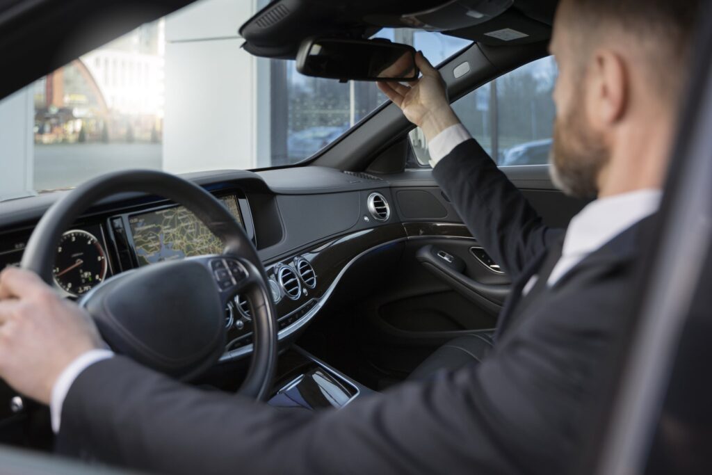 elegant uber driver giving taxi ride 1